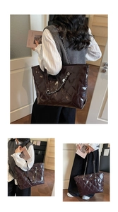 Detail of dark red-brown quilted tote bag with glossy finish and silver chain straps