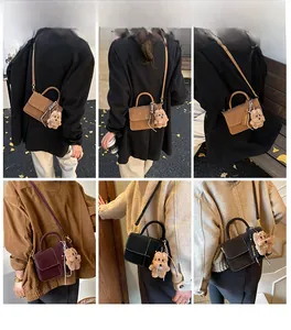 Detail shots of vintage small square bags in brown, burgundy, and black with teddy bear charms