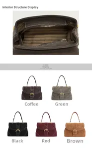 Detail view of vintage matte leather handbag featuring striped lining and inner zip pocket