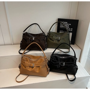 Detail view of high-quality faux leather tote bags in four colors with contrast stitching