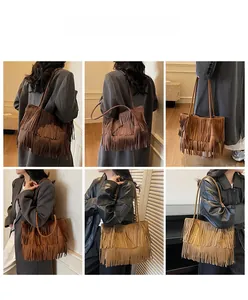 Detail showing multi-layer suede fringe on large capacity tote bags in vintage brown