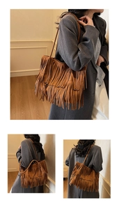 Detailed view of brown suede tote bag featuring long bohemian style side tassels
