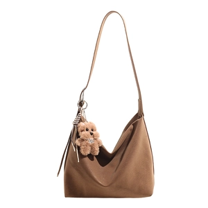 Classic dark brown PU leather tote bag with a cute plush bear pendant accessory