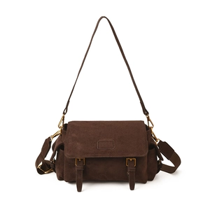 Retro dark brown faux suede crossbody bag with vintage buckle straps and adjustable strap