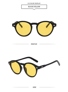 Detailed front and side views of vintage round black sunglasses with yellow lenses