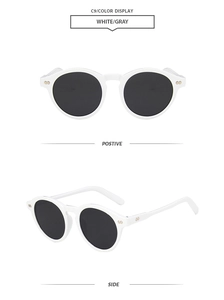 Retro round white sunglasses featuring vintage metal rivet details and dark lenses