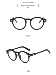 Front and side view of black round vintage sunglasses with gold rivet details