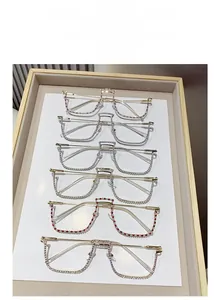 Detailed view of fashion half-frame glasses with luxury rhinestones in various colors