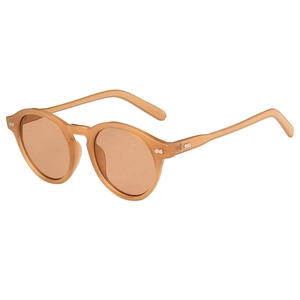 Vintage round tea sunglasses with translucent frames and silver rivets in side view