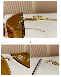 Detail of golden leopard emblem on rimless brown gradient sunglasses with metal temples