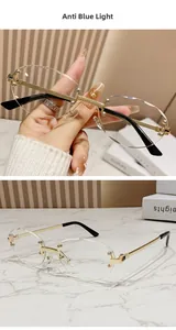 Close-up of rimless oval glasses with gold metal hardware and cut-edge lenses