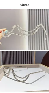 Close-up of silver semi-rimless wavy glasses frame with double layer rhinestone tassels