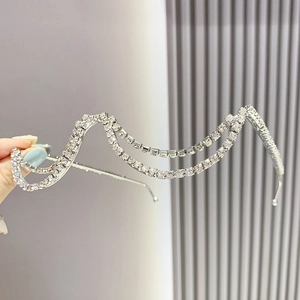 Silver double-layer rhinestone headband featuring a wavy chain design for formal events