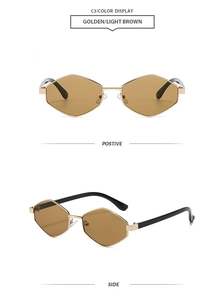 Macro detail of geometric hexagonal sunglasses with golden metal frames and brown lenses