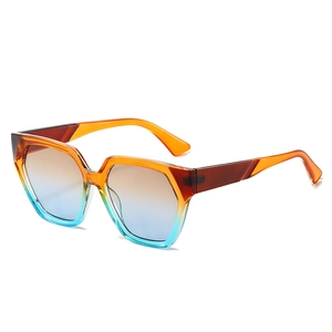 Chic oversized polygonal sunglasses with orange and blue gradient frame and lenses