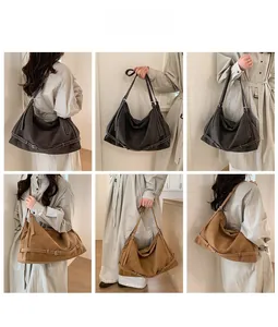Detail shots of minimalist suede tote bag in dark brown and camel showing shoulder strap and buckles