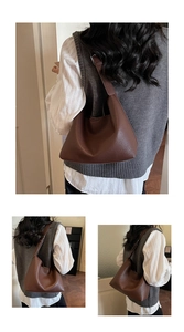 Detail of dark brown pebble leather shoulder bag showing large capacity and rich texture