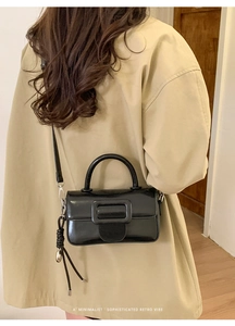Retro black patent leather handbag with square buckle and decorative knot pendant