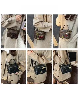 Detailed views of quilted box bag with cherry charm in black and brown finishes