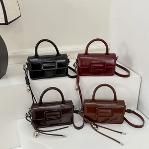 Retro square handbags in four colors with oversized buckles and adjustable straps