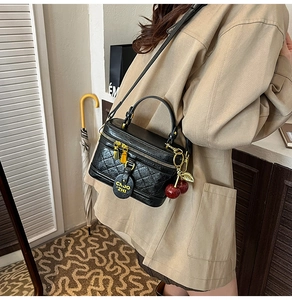 Crossbody small box bag in black quilted faux leather with cute red cherry charm detail