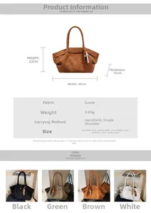 Detail view of large faux suede tote bag with fringe charm and dimensions specification
