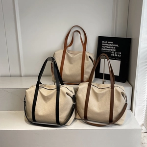 Large canvas tote bags for travel and commuting with versatile shoulder straps