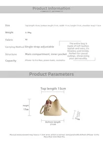 Detailed size specifications for the beige bucket bag with plush charm and strap