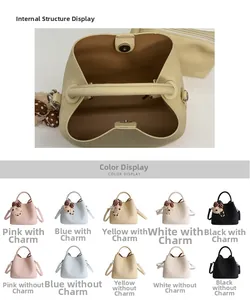 Detail of lychee pattern bucket bag with magnetic clasp and internal zip pouch display