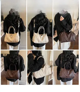 Detailed views of vintage tote bags in beige and coffee colors with crossbody strap