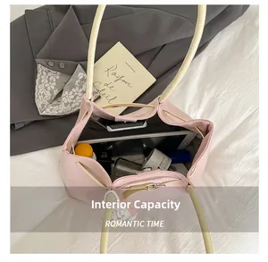 Top view of spacious cream tote bag interior filled with daily tech and cosmetics