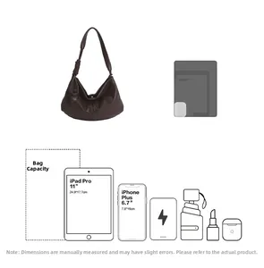 Hobo bag capacity detail showing it fits iPad Pro 11 inch and daily essentials
