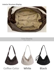 Detailed interior view showing zipper pocket and three vintage tote bag colors