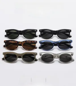 Collection of vintage oval sunglasses in black, tortoiseshell, and transparent colors