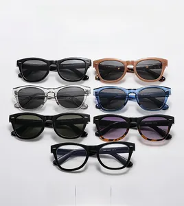 Close-up of vintage oversized sunglasses collection with rivet details in multiple colors