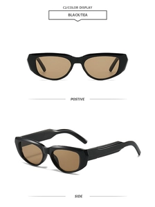 Detail view of retro wide-frame sunglasses in black and tea lens with side profile