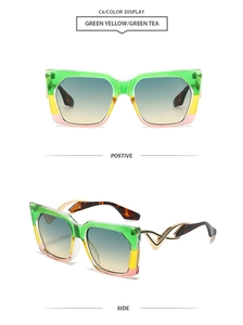 Detail view of square sunglasses with gold V-metal decor and tortoiseshell temples