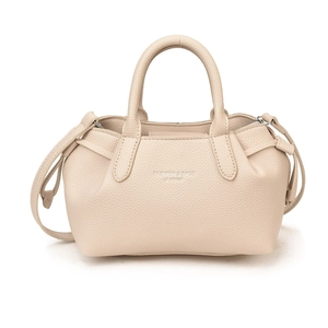 Beige faux leather bucket bag with top handles and shoulder strap in a casual retro style