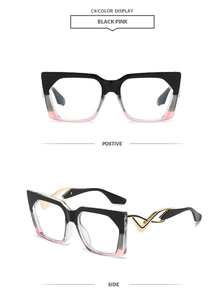 Detail of gold hollow wave temples and black to pink gradient square frame sunglasses