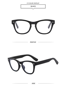 Front and side views of vintage black oversized cat-eye sunglasses with rivet detail