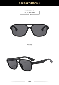 Front and side view of modern black aviator sunglasses with double bridge and gray lenses