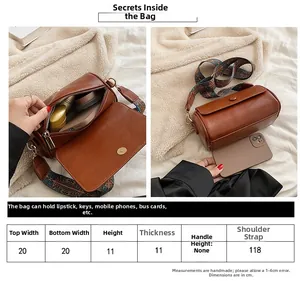 Detailed dimension chart for vintage brown cylinder bag with ethnic strap measurements