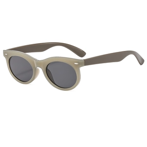 Retro oval sunglasses with olive green frames and tinted lenses for UV protection