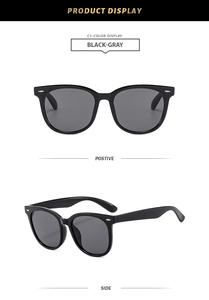 Detail view of retro square sunglasses in black-gray with premium dark polarized lenses