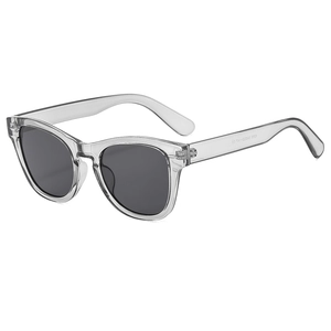 Modern oversized rivet sunglasses with transparent grey frame and grey sun protection lenses