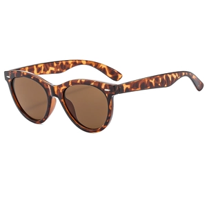 Classic tortoise shell cat eye sunglasses with brown lenses and silver stud details