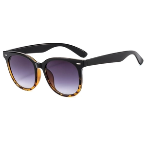 Vintage square sunglasses with black and tortoiseshell frames and gradient lenses