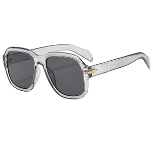 Modern vintage oversized square sunglasses with transparent gray frame and dark lenses