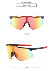Vue macro des verres miroirs dégradés rouge-orange sur lunettes de vélo noir-rouge