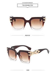 Detail of square tea sunglasses with gradient lenses and gold chain-link temple design